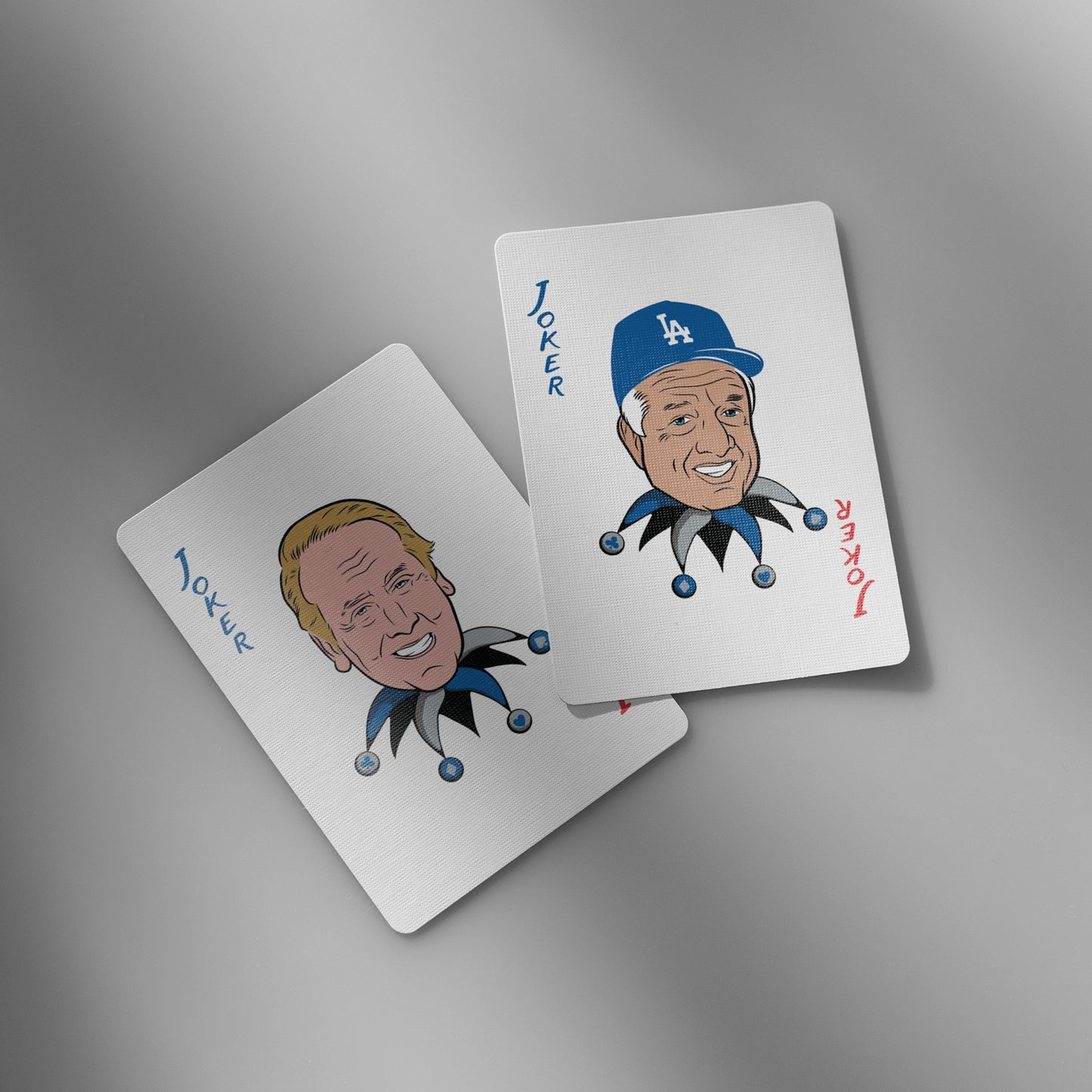 Close-up of Dodgers playing cards showing Joker cards with iconic player caricatures