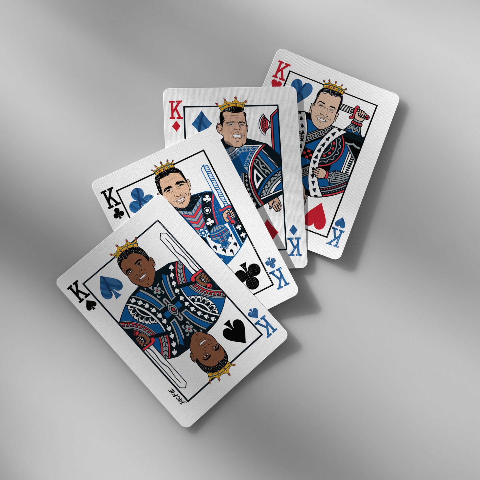 Close-up of Dodgers playing cards showing King face cards with iconic player caricatures