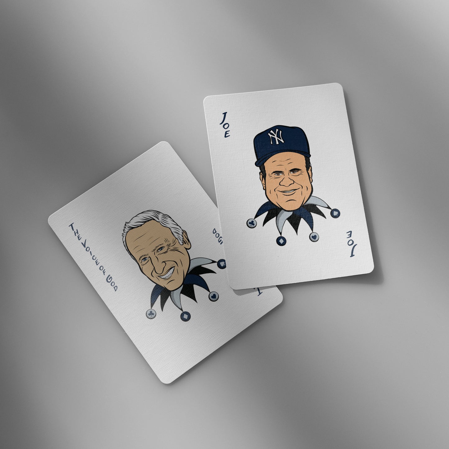 Close-up of Yankees playing cards showing Joker cards with iconic player caricatures