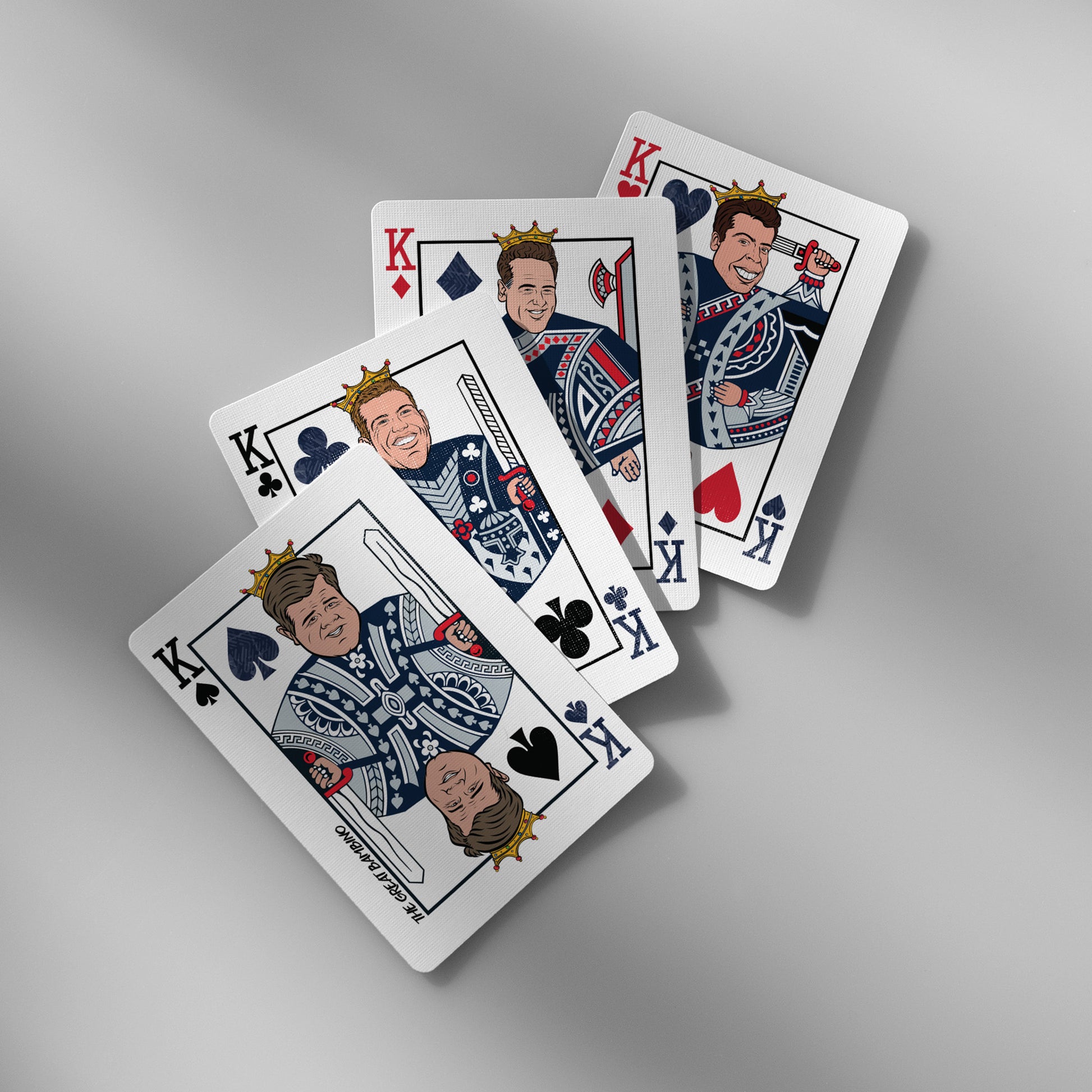 Close-up of Yankees playing cards showing King face cards with iconic player caricatures